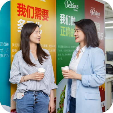 two Asian women in conversation